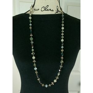 Single strand beaded necklace on silver tone chain